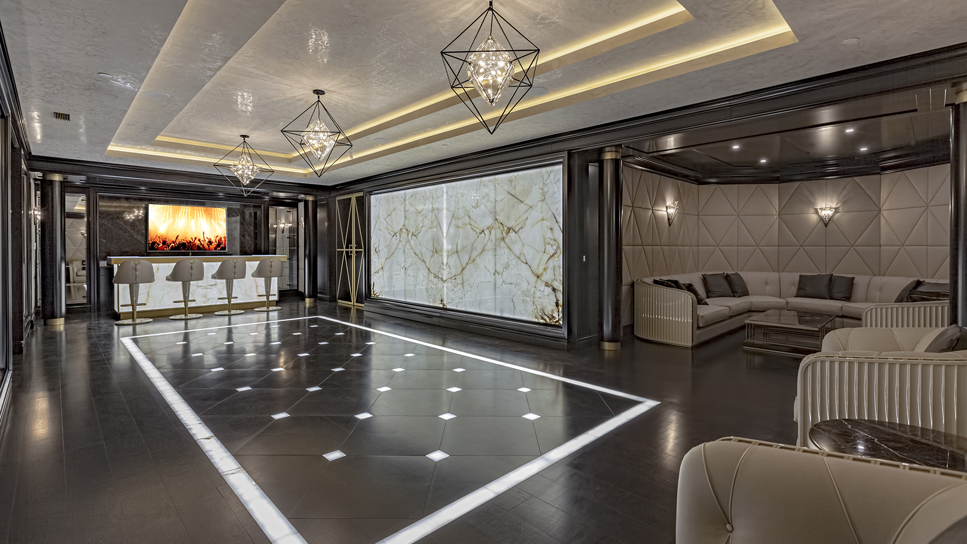 Altamont's Muse entertainment lounge with LED dance floor and onyx wall in West Vancouver