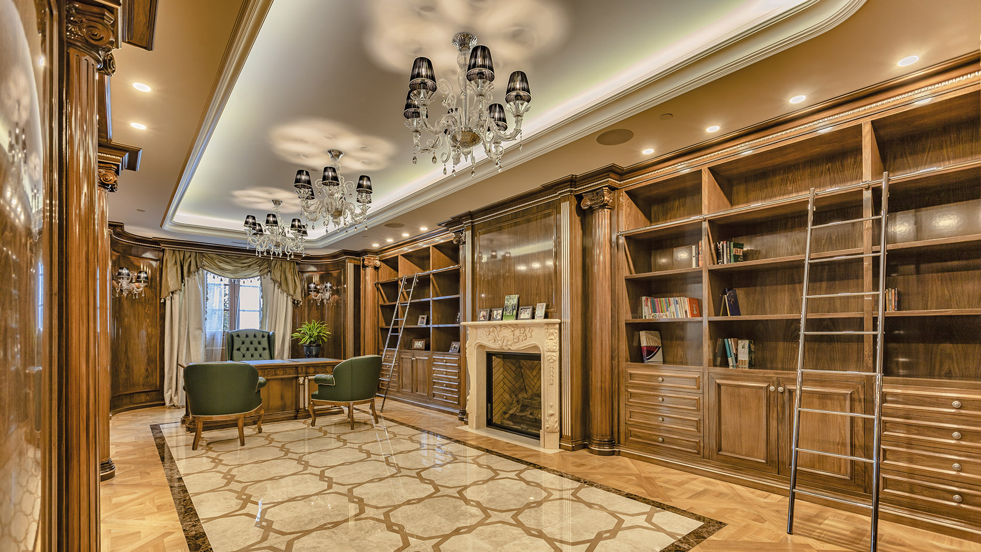 Ambleside Palace private library with built-in walnut shelving rolling ladders and carved stone fireplace in West Vancouver
