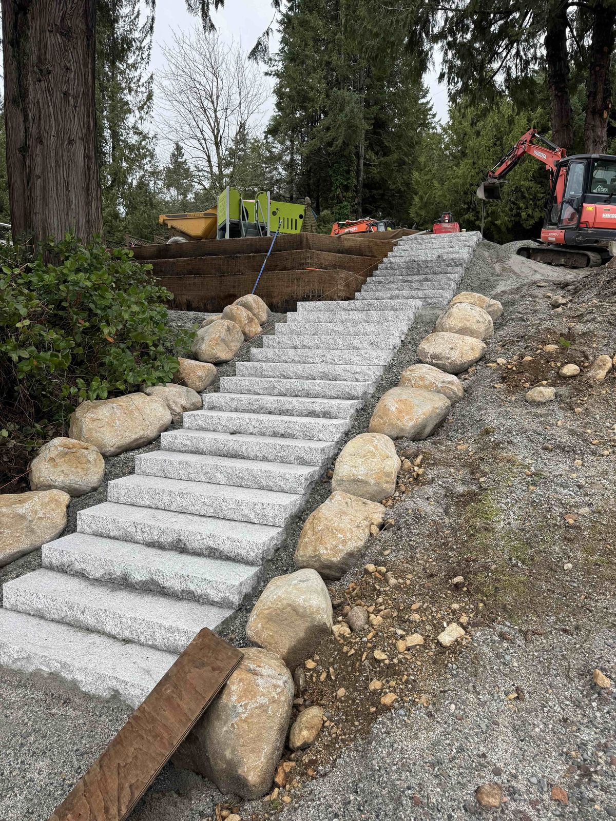 Granite stair construction with boulder edging at Lions Bay Beach Park by Eurohouse Construction