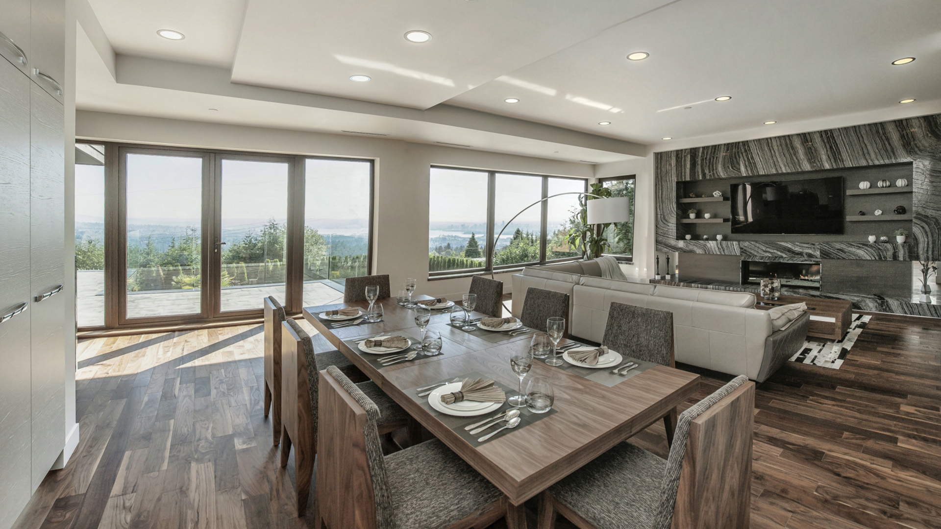 Alternate view of entrance foyer showing marble flooring detail walnut stair treads and decorative art glass sidelights Millstream British Properties West Vancouver