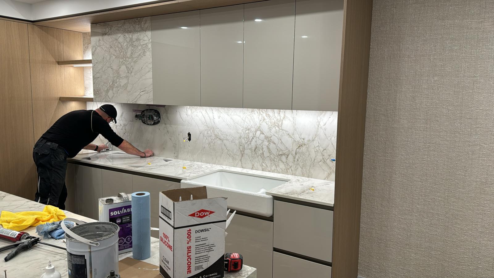 Marble countertop and backsplash installation in the Pierwell presentation centre kitchenette by Eurohouse crew