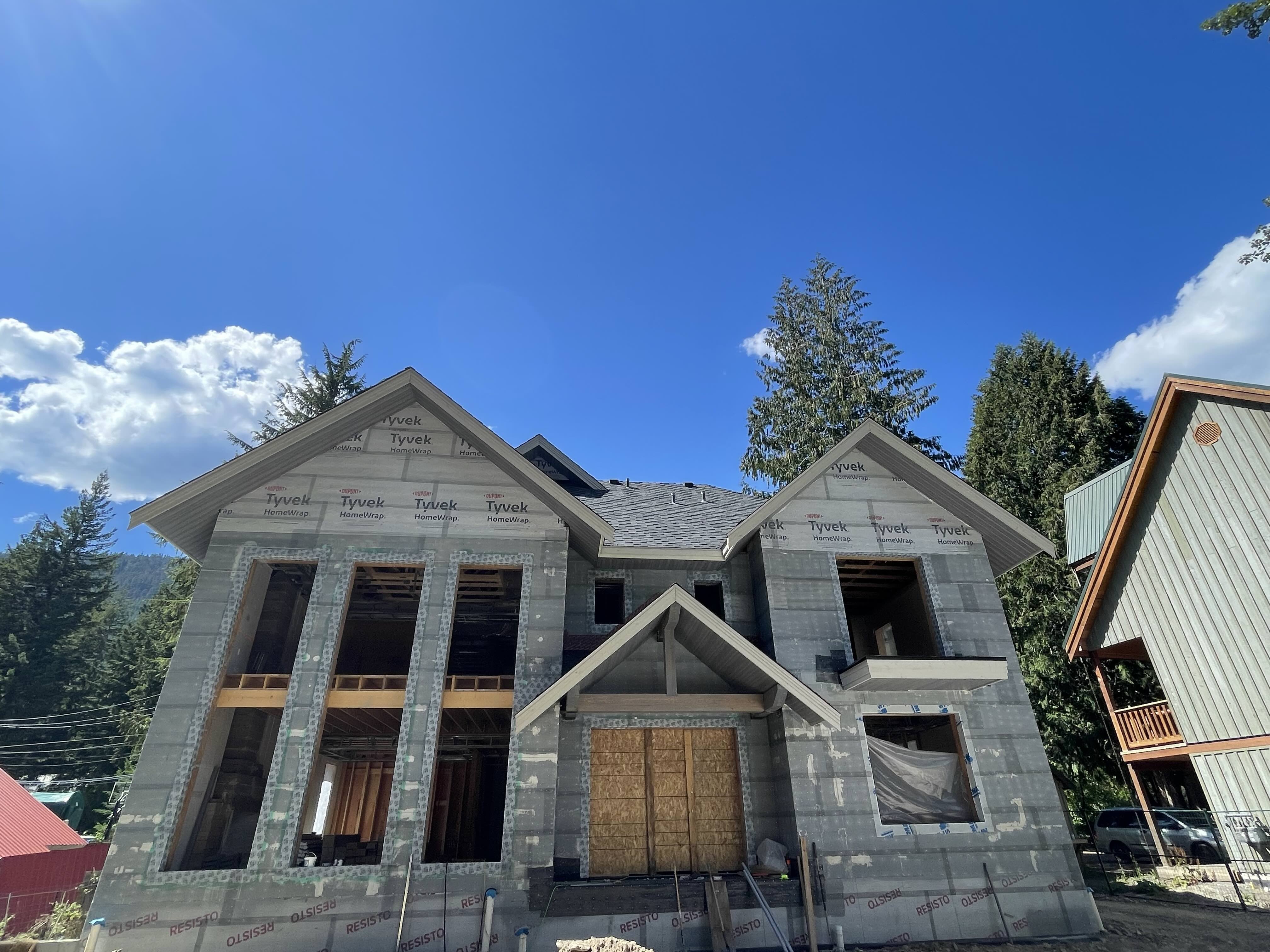Roof sheathing and ICF wall construction progress at Rainbow in Whistler custom home by Eurohouse Construction