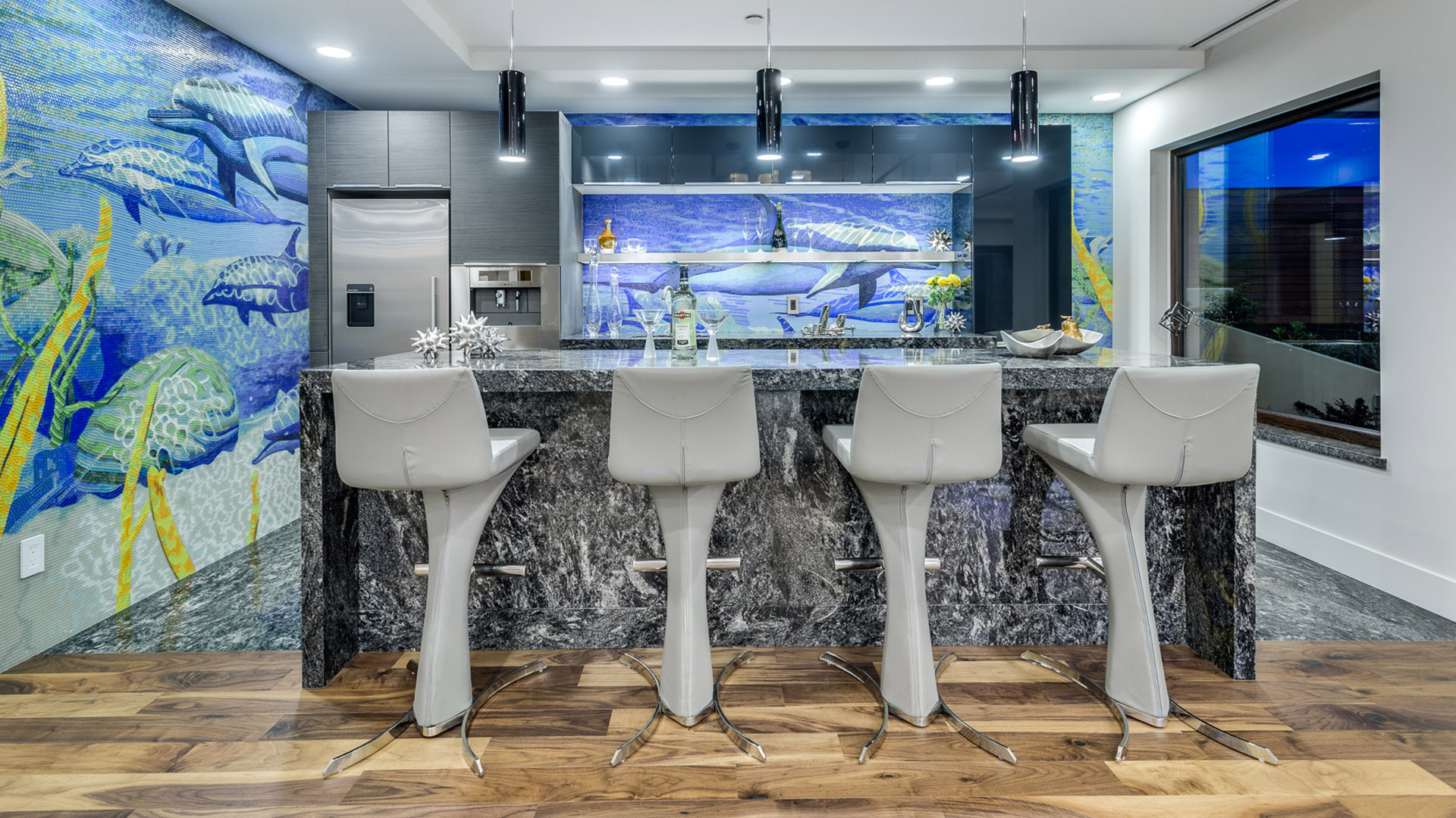 Custom bar with ocean mosaic mural marble counters Italian cabinetry and designer bar stools West Coast Contemporary British Properties West Vancouver