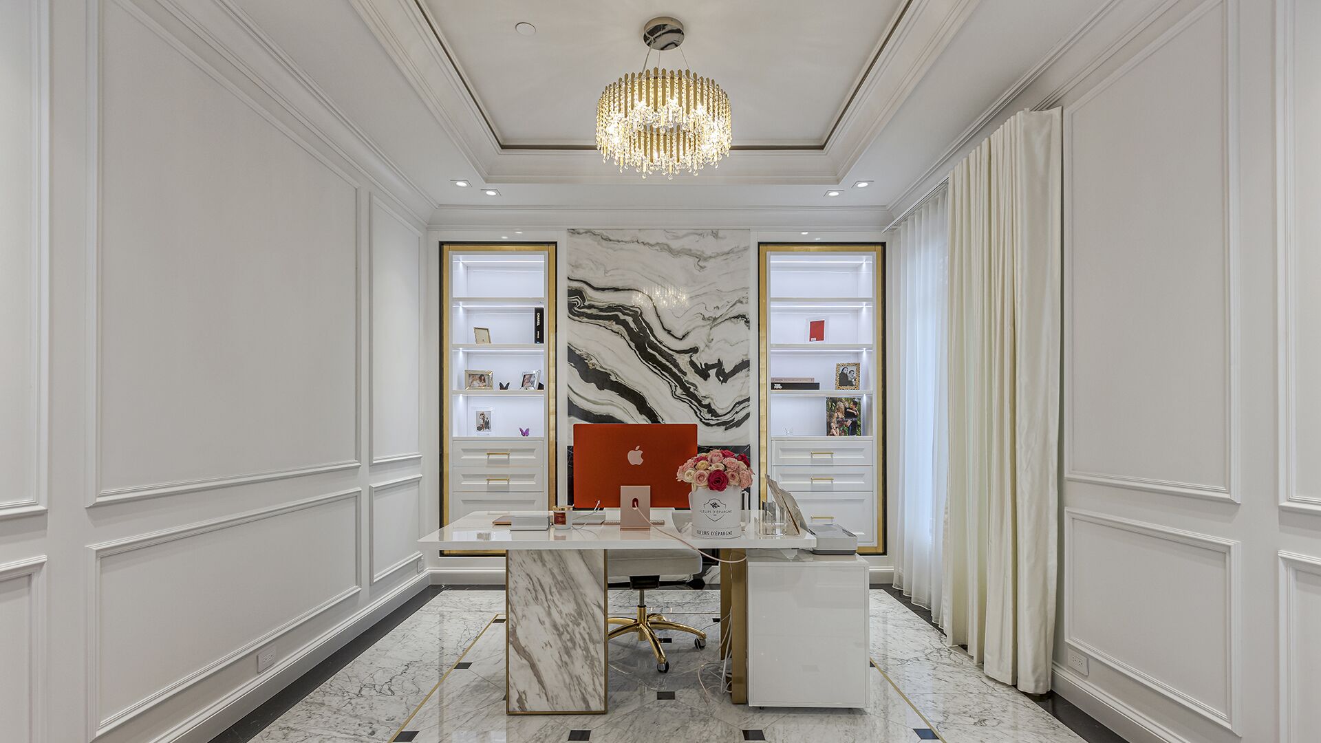 Private office with marble desk gold accents crystal chandelier and veined marble feature wall West Vancouver luxury home Eurohouse Construction