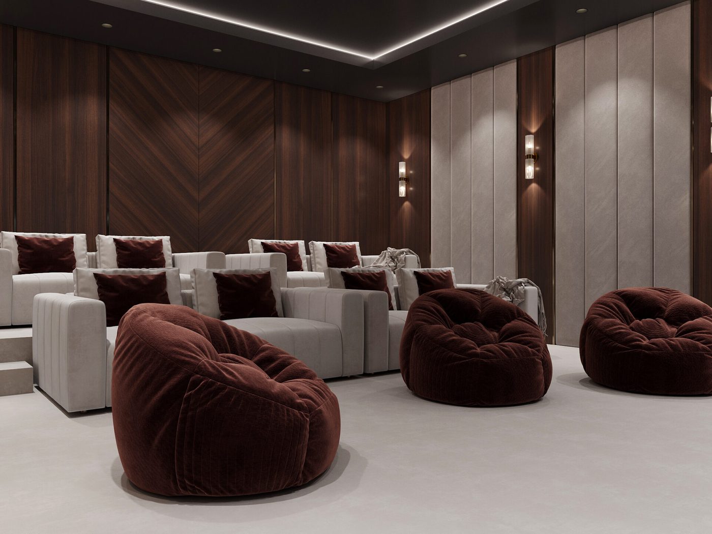 Private cinema with tiered seating and chevron walnut walls at Wingline House by Eurohouse Studio